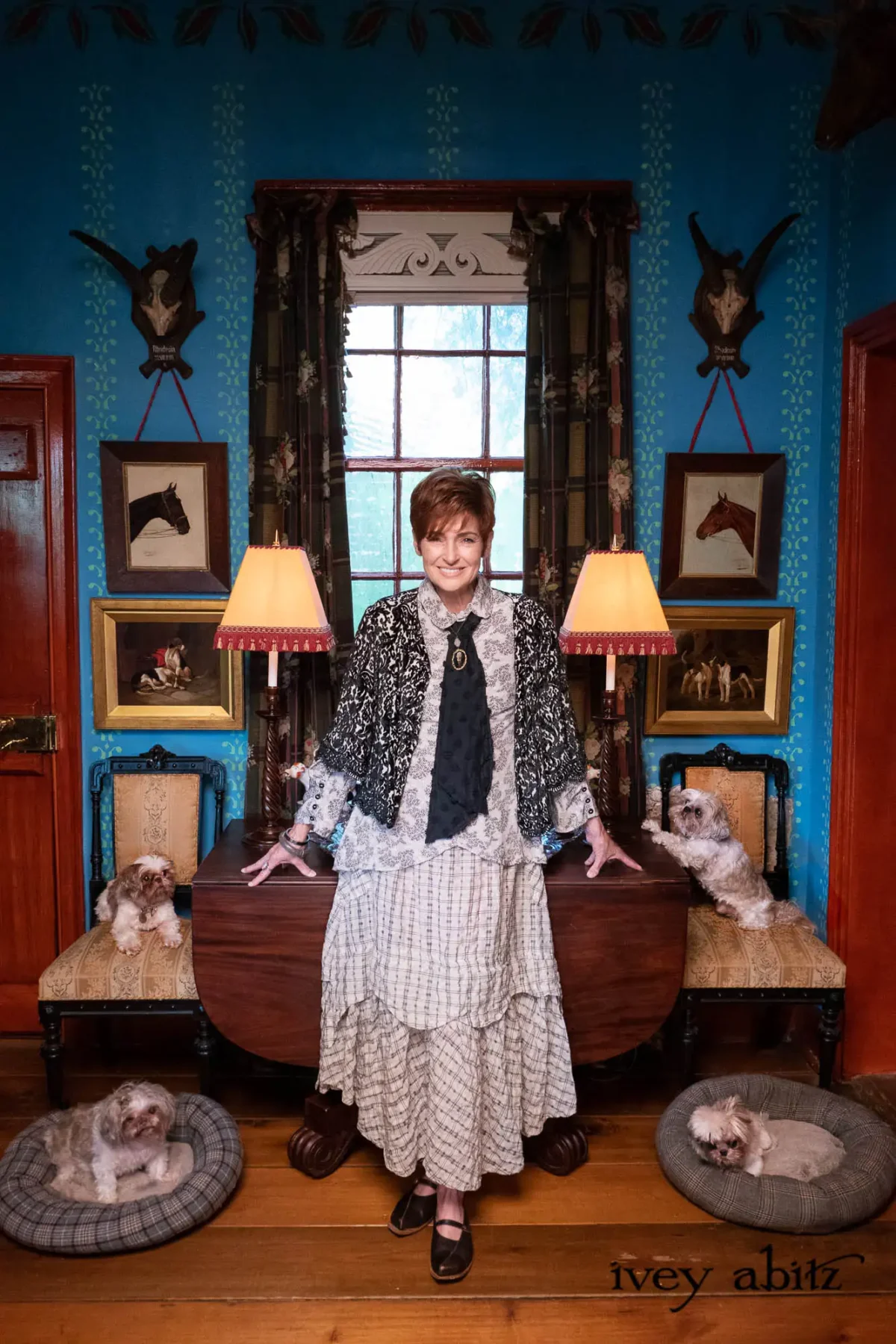 Carolyn Hennesy with Ivey Abitz rescue dogs. An outfit from the Winter Spring 2023 Ivey Abitz Bespoke Clothing collection.